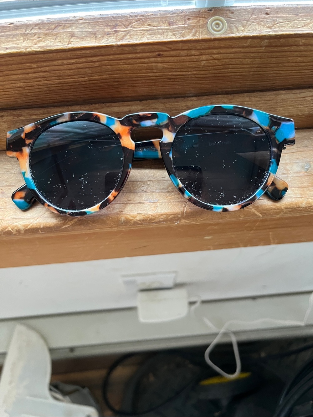 Round Multicolor Tortoiseshell Sunglasses — Blue & Brown Accent